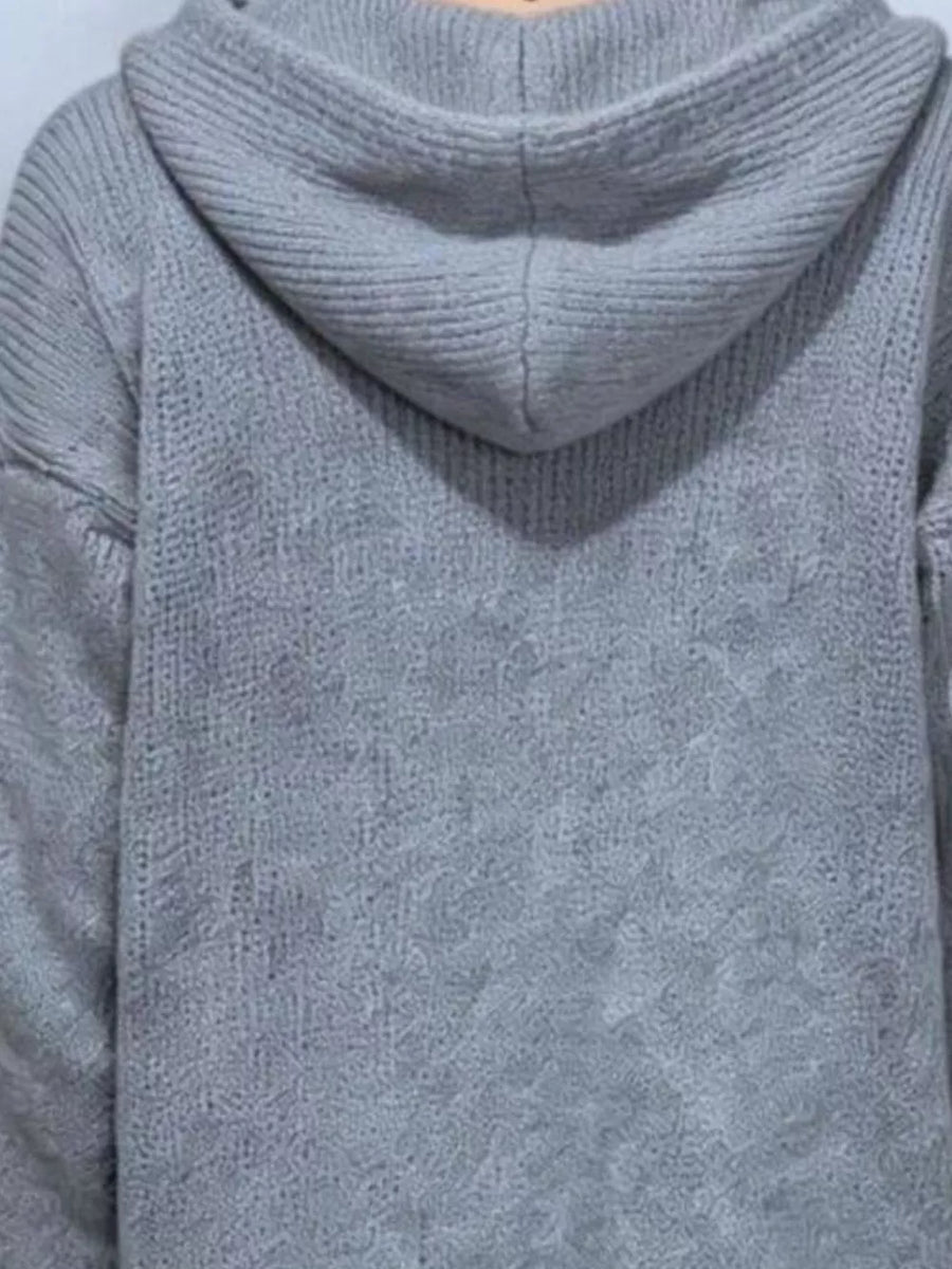 100% polyester Care instructions: Machine wash cold cardigan in Black with relaxed silhouette