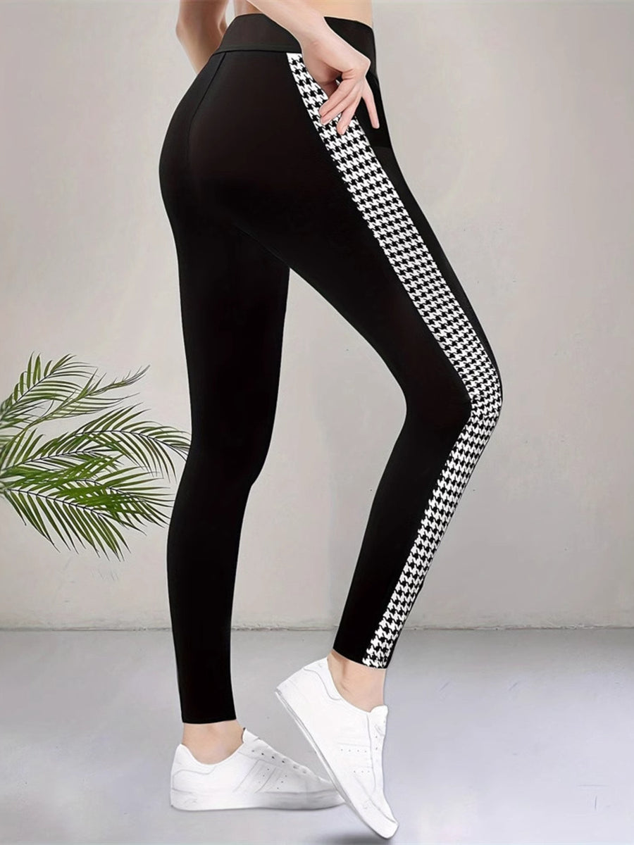leggings in black featuring high-waisted and fitted fit