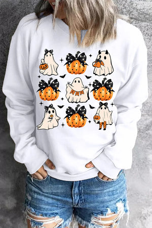 White crewneck sweatshirt with a spooky patchwork graphic of ghosts and pumpkins.