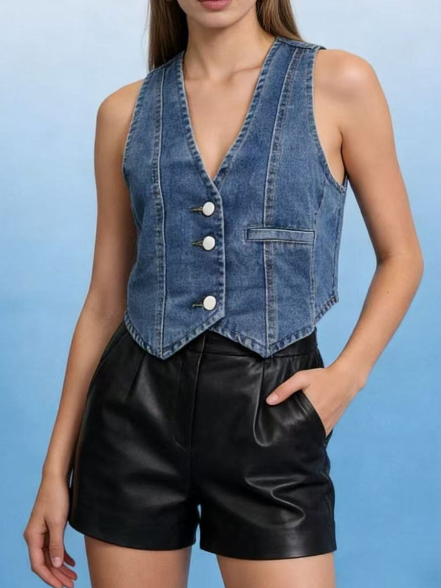Chic button-down denim vest in dark blue with white buttons and a V-neck.