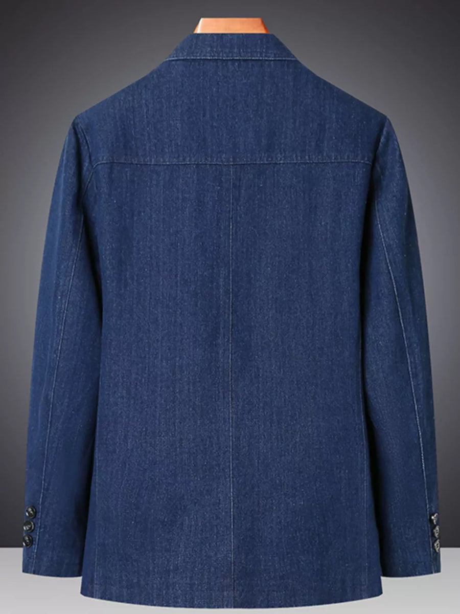 Textured dark blue denim blazer with notched lapels and buttoned cuffs.