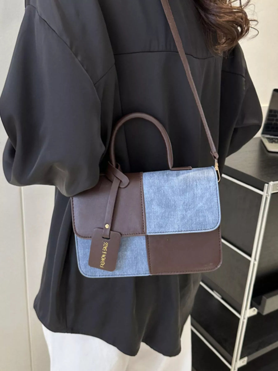 Chic two-tone PU leather crossbody bag with brown and light blue patchwork design.