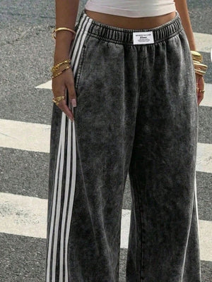 track pants in Pink with high-waisted and full-length