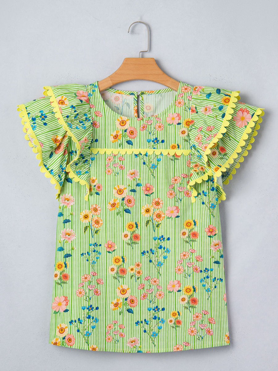 Green striped cotton blouse with floral print, ruffle sleeves, and yellow trim.