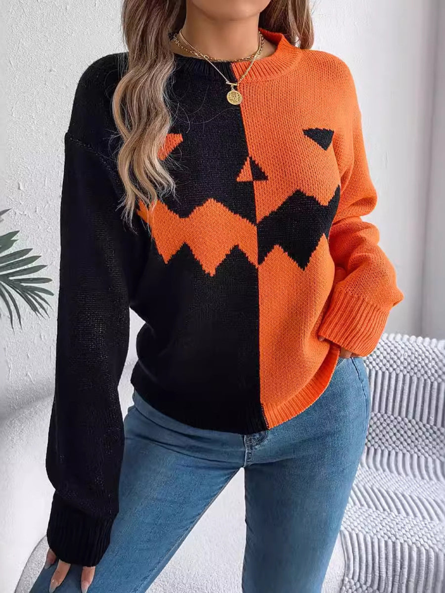 orange pullover sweater with graphic and crew neck