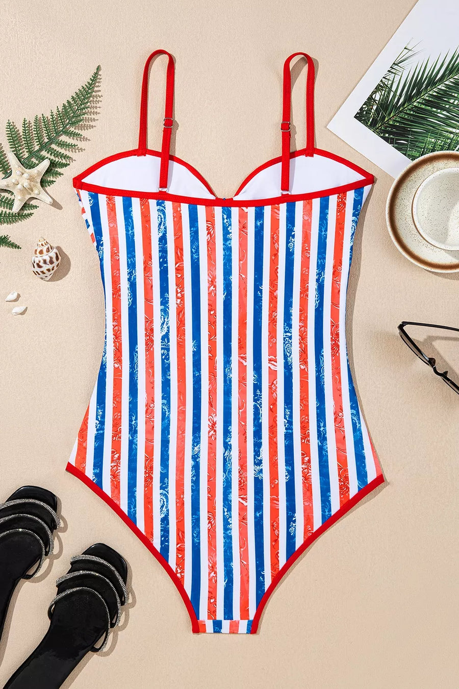 royal blue one-piece swimsuit with removable padding and spaghetti strap