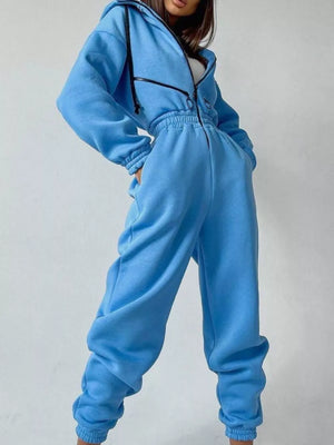jumpsuit in sky blue featuring drawstring and relaxed fit