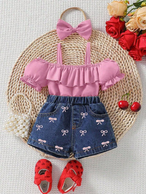 Pink ruffle top with puff sleeves and denim shorts with bow print, includes headband