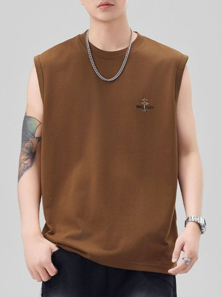 Men's oversized caramel cotton tank top with embroidered logo detail on chest.