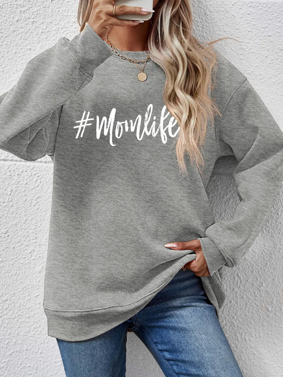 Crewneck sweatshirt in Charcoal with white #Momlife graphic print.
