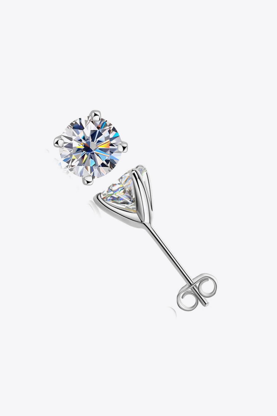 Silver moissanite solitaire stud earrings with sculpted setting and butterfly backs.
