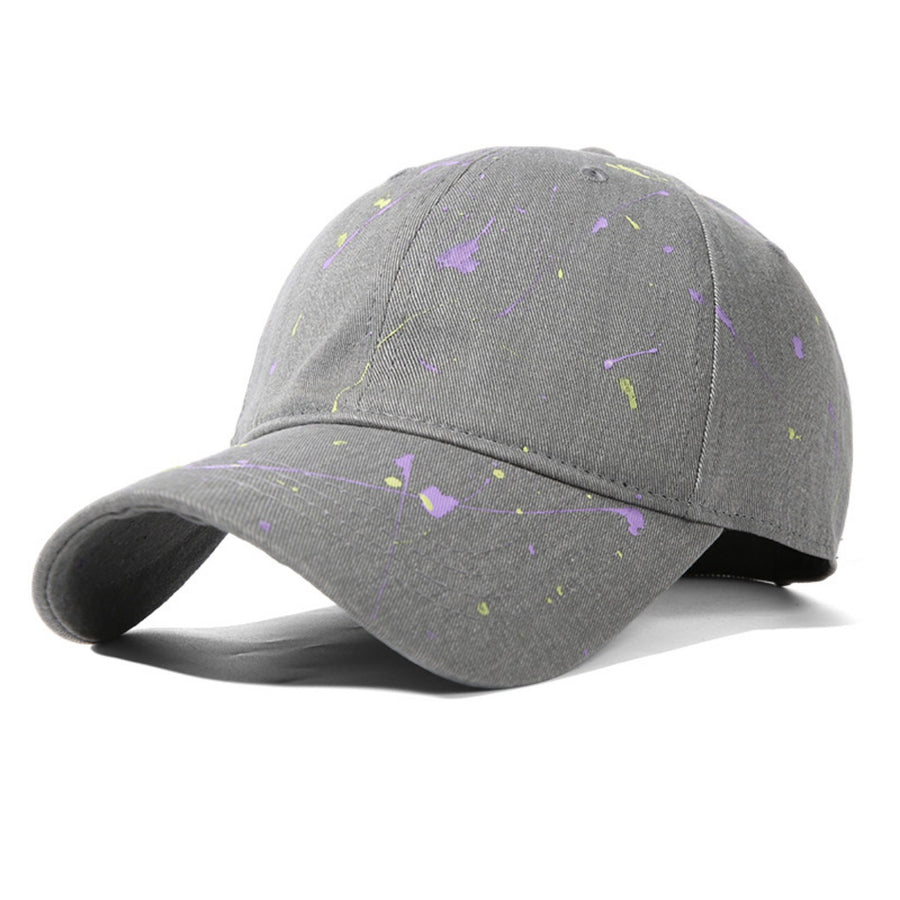 Gray cotton baseball cap with purple and yellow splatter paint detail.