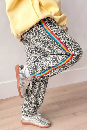 black joggers featuring button-front closure and leopard