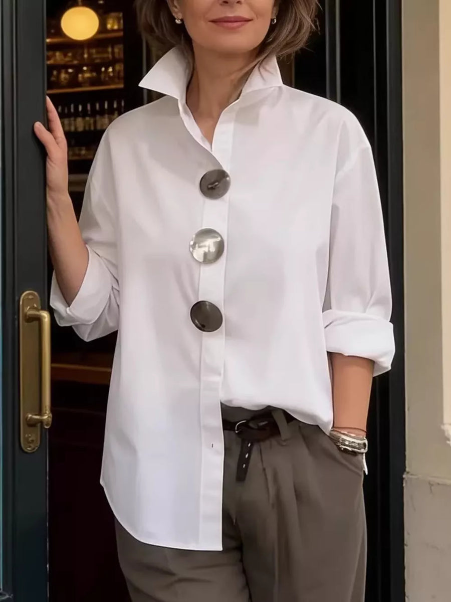 button-up shirt in white featuring collared and oversized fit