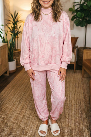 light pink pajama set with camouflage and mock neck