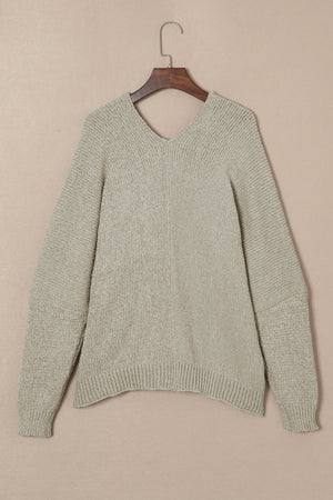 Khaki plush knit cardigan with deep V-neck and ribbed cuffs and hem.