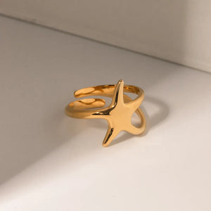 Gold adjustable ring with a starfish silhouette detail