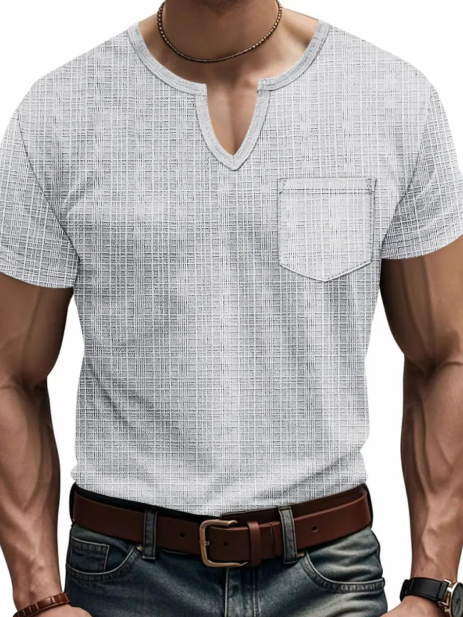 Gray textured notch neck tee with chest pocket and short sleeves.