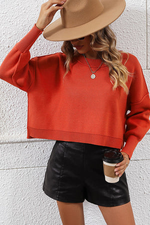 Neon cropped dolman sleeve knit sweater in Orange-Red