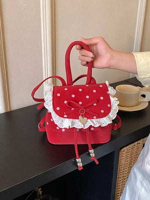 backpack in Red with polka dot and lace trim