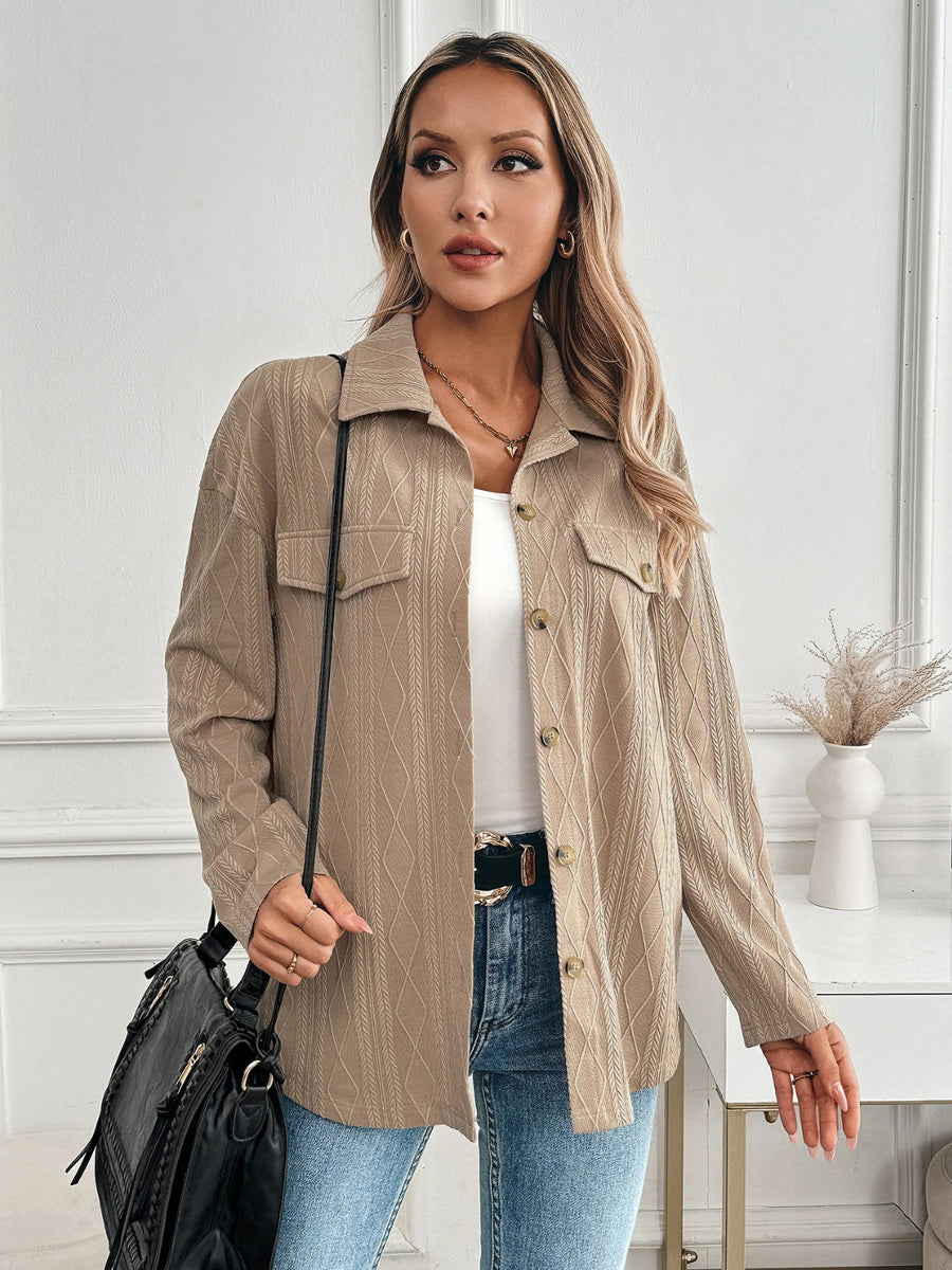 Camel utility jacket with diamond weave pattern, button front and chest pockets.