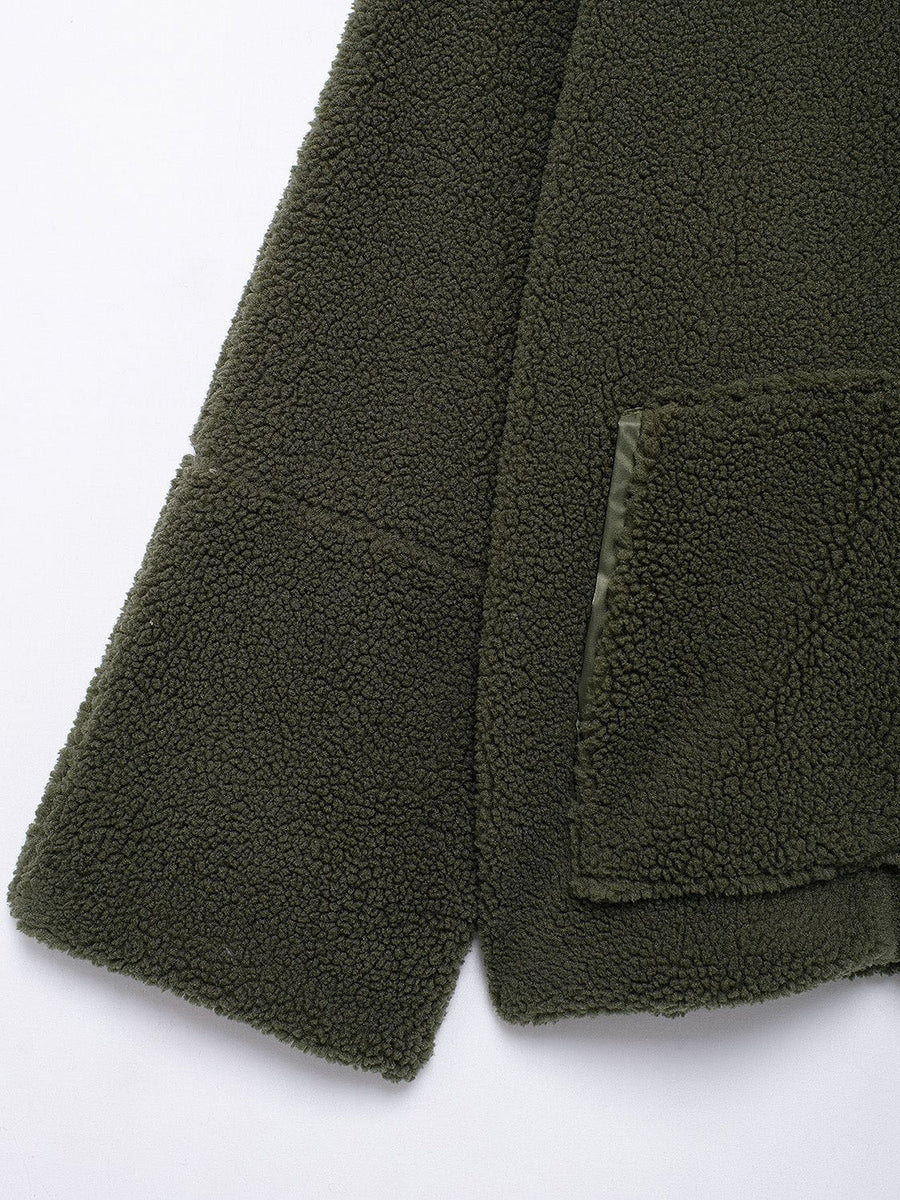 Olive green sherpa jacket with a textured fleece fabric and a patch pocket detail.