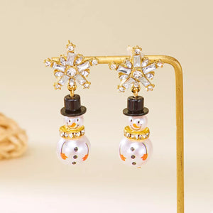 Synthetic Pearl, 18K Gold-Plated, Alloy, Resin, Rhinestone Care instructions: Av earrings in clear with dangling silhouette