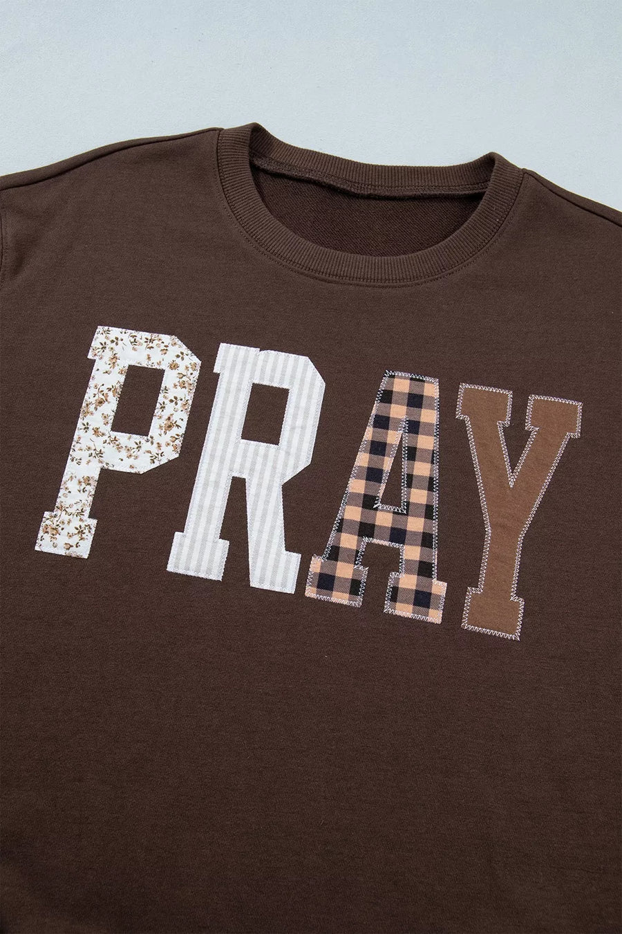 dark brown sweatshirt with pullover and plaid