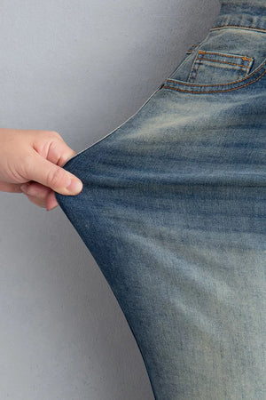 Pocket Detail Flare Leg Jeans in medium wash blue with pocketed