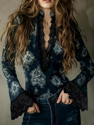 dark teal blouse with floral and deep v-neck
