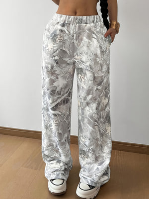 100% polyester Care instructions: Machine wash cold wide-leg pants in dark gray with loose silhouette