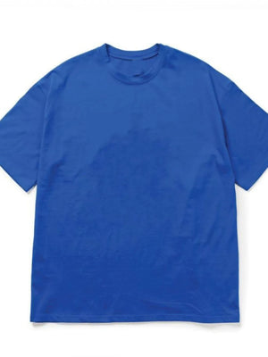 Blue oversized crew neck t-shirt with textured fabric and short sleeves.