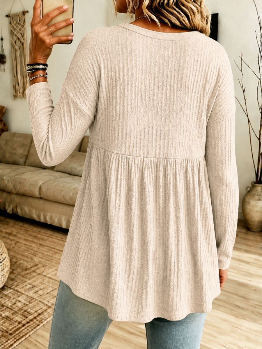 cream blouse with hip-length and half-button