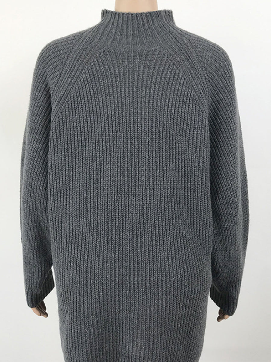 Charcoal ribbed knit cocoon turtleneck dress with long sleeves.