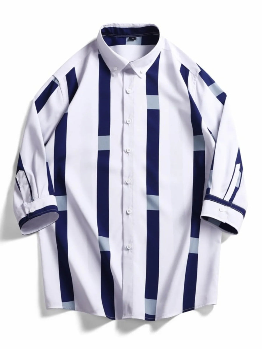 Oversized button-up shirt with white, navy, and light blue stripes.