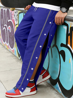 pants in Black with side snap buttons and full-length