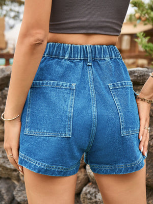 Cargo denim high-waist shorts in blue with elastic waistband and patch pockets.