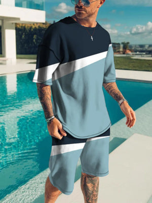 Men's colorblock t-shirt and shorts set in navy, light blue, and white.