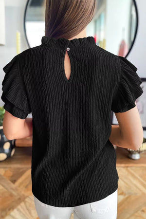 Black textured maternity shirt with frilled ruffle sleeves and mock neck with keyhole detail.