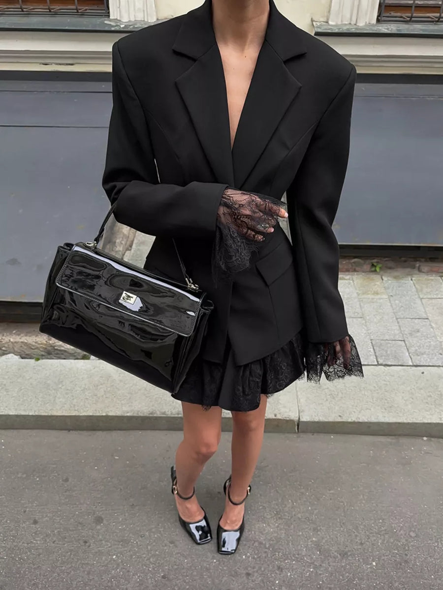 black blazer with thigh-length and button-front