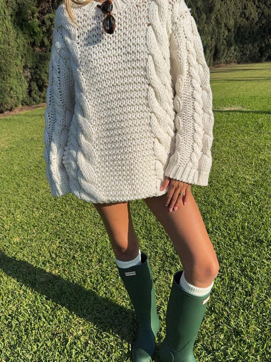 Off-white pullover sweater featuring cable-knit and cable knit