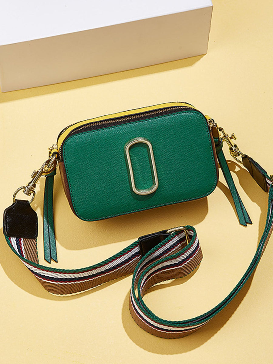 dark green crossbody bag with flap and color-block