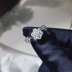 silver ring with floral and N/A