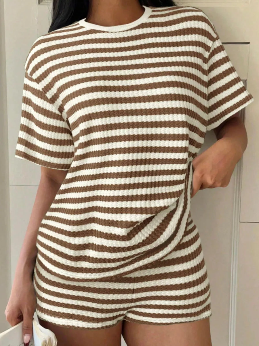 Brown and white striped waffle knit two-piece loungewear set with crew neck top and shorts.