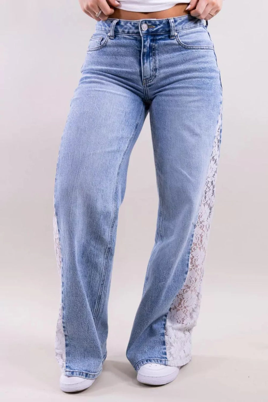 light blue wide-leg jeans with full-length and button-front