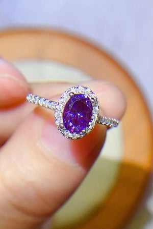 Purple moissanite oval halo ring in silver with pave band