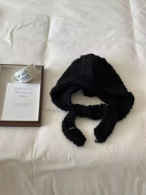 Black chunky knit wool earflap beanie with ties