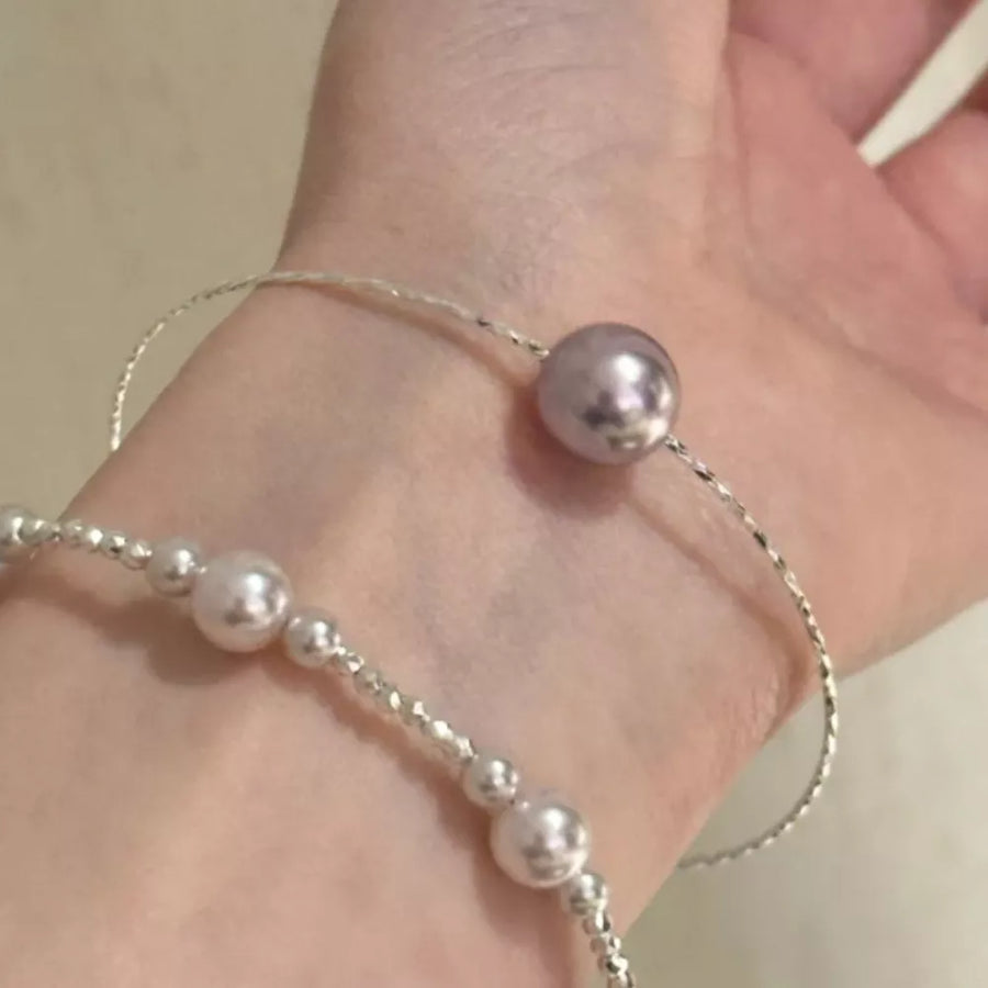 Synthetic Pearl,925 sterling silver Care instructions: Avoid wearing during exer bracelet in cream with fitted silhouette