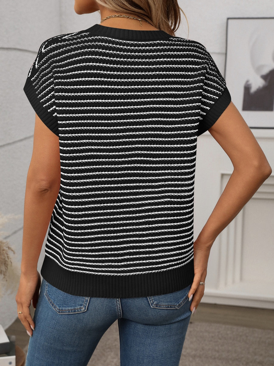 Horizontal stripe knit shell top in black and white with short sleeves.