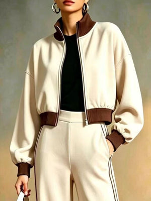 95% polyester, 5% elastane Care instructions: Machine wash cold tracksuit in Mustard with relaxed silhouette